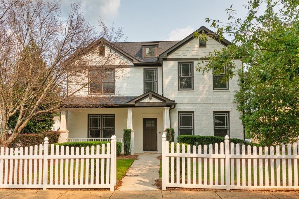 a front view of a house with a porch