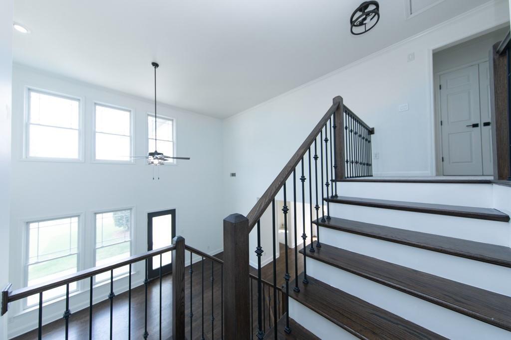 3501 Downing Drive Cumming, GA 30040 - Photo 23 of 26 a view of entryway and hall with wooden floor