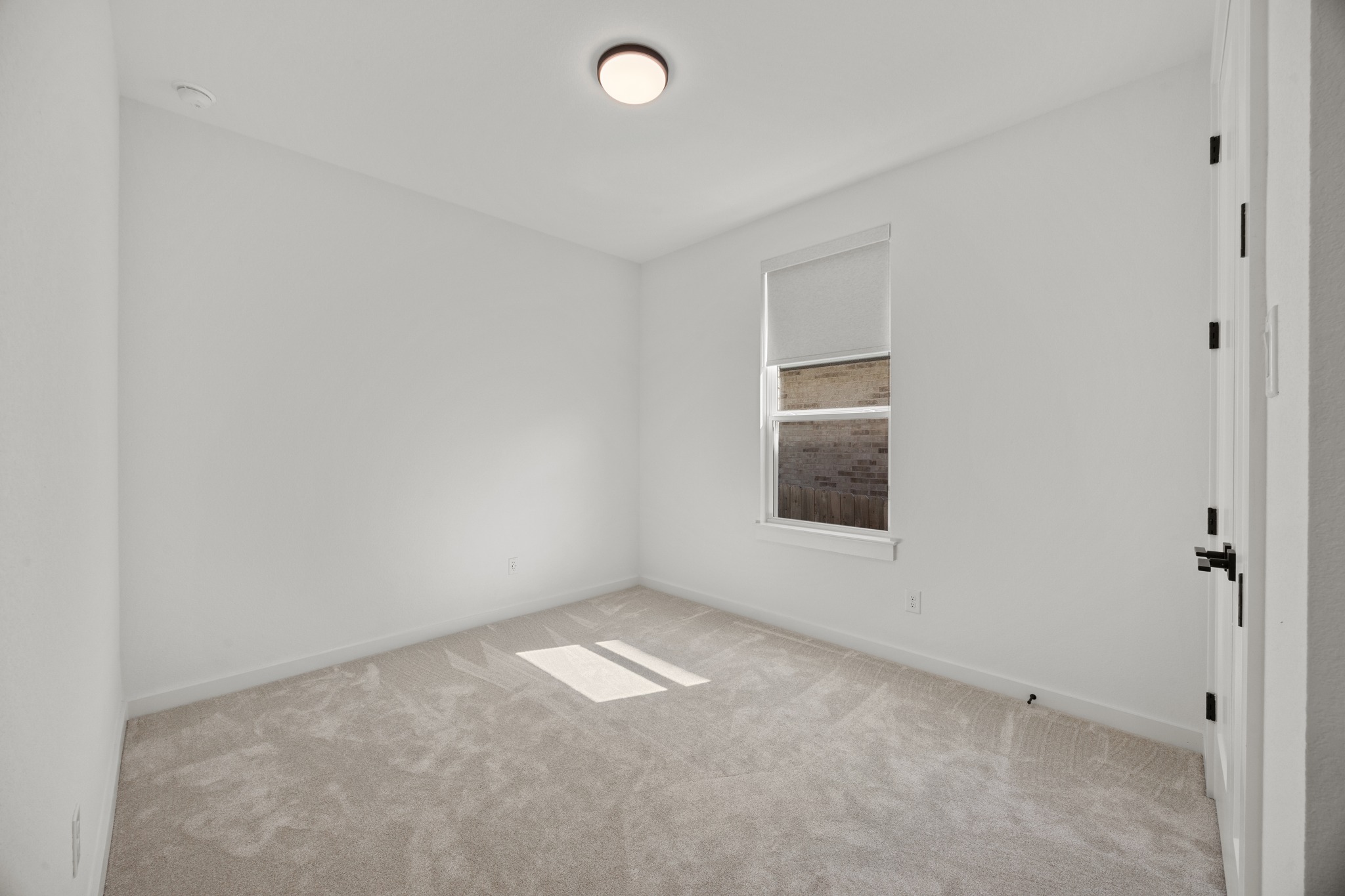 6000 Sean Paul Lane Georgetown, TX 78628 - Photo 30 of 35 Empty room featuring carpet floors and baseboards