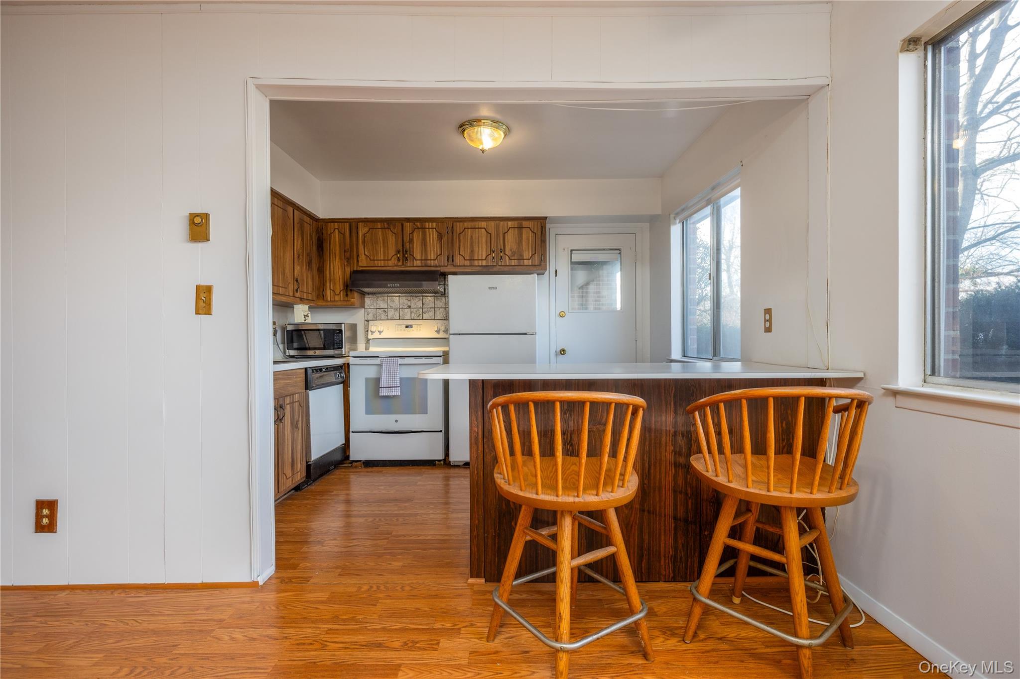 306 Old Country Road, Unit 306 Elmsford, NY 10523 - Photo 13 of 35 Same view of the kitchen and peninsula as it currently exists.