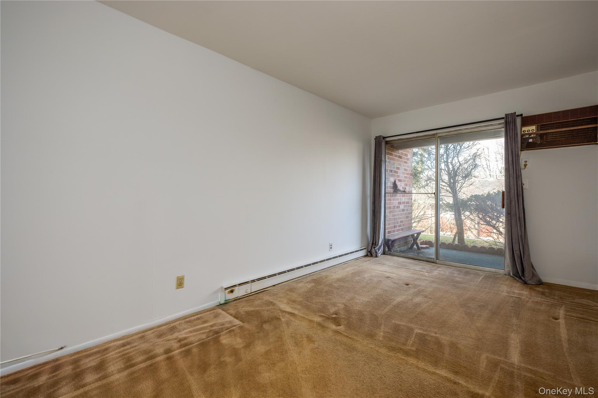 306 Old Country Road, Unit 306 Elmsford, NY 10523 - Photo 18 of 35 Same view of the primary bedroom as it currently exists.