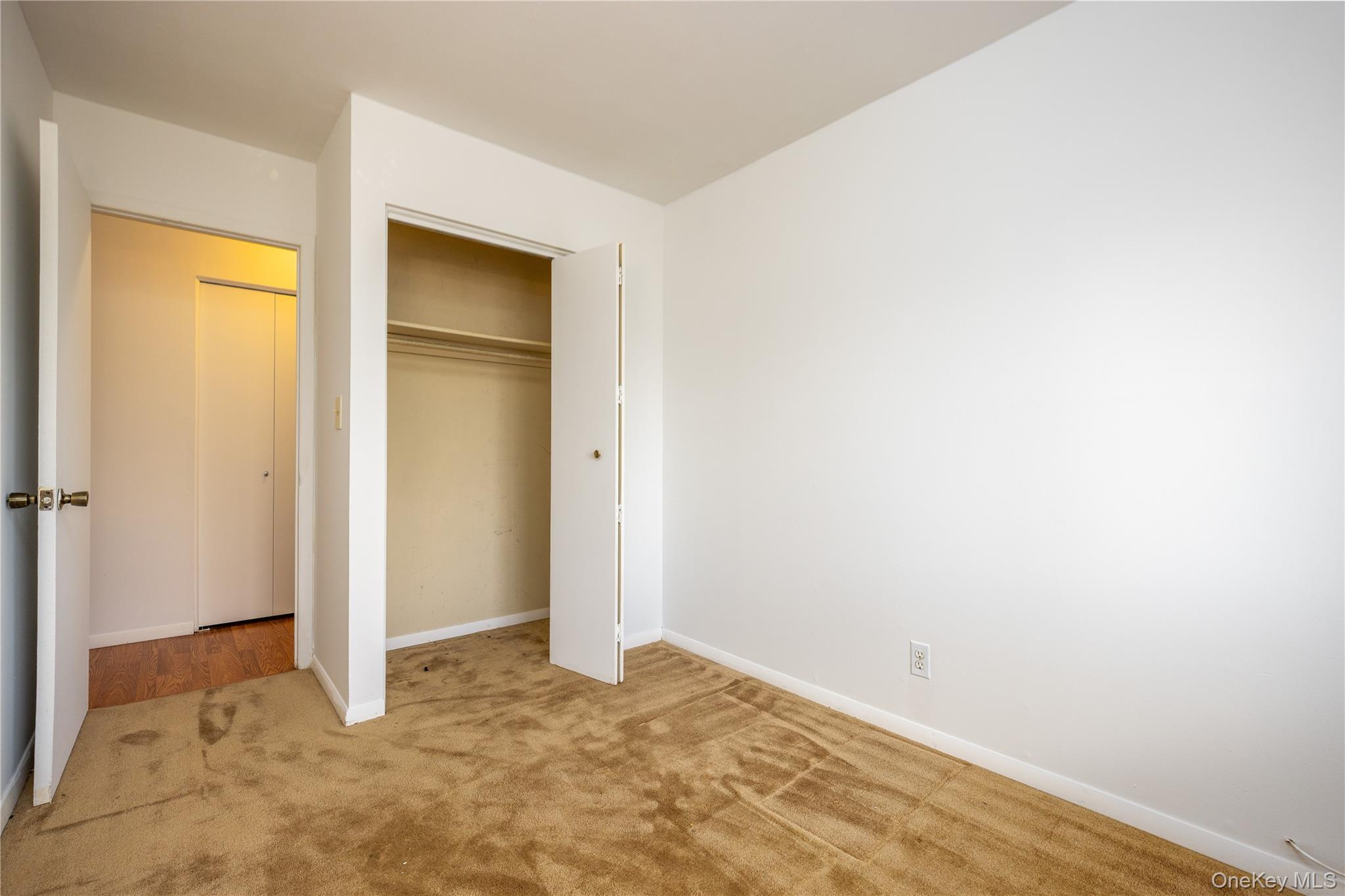 306 Old Country Road, Unit 306 Elmsford, NY 10523 - Photo 22 of 35 Another view of the second bedroom, showing the closet.