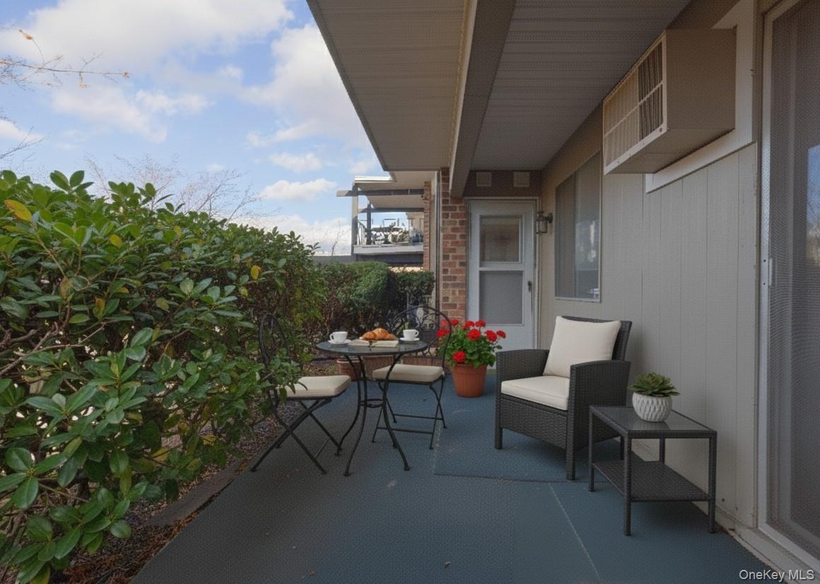306 Old Country Road, Unit 306 Elmsford, NY 10523 - Photo 25 of 35 Virtually staged photo of patio.