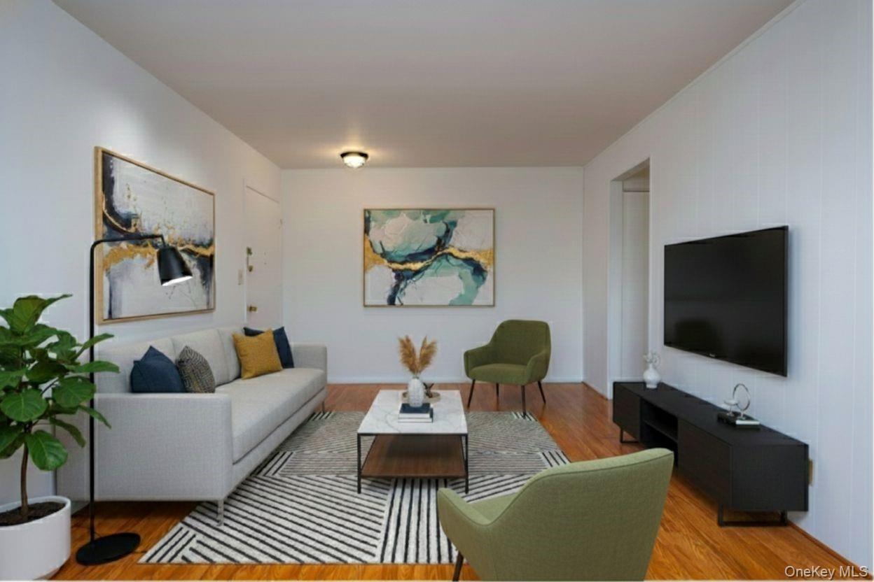 306 Old Country Road, Unit 306 Elmsford, NY 10523 - Photo 7 of 35 Virtually staged photo of the living room.