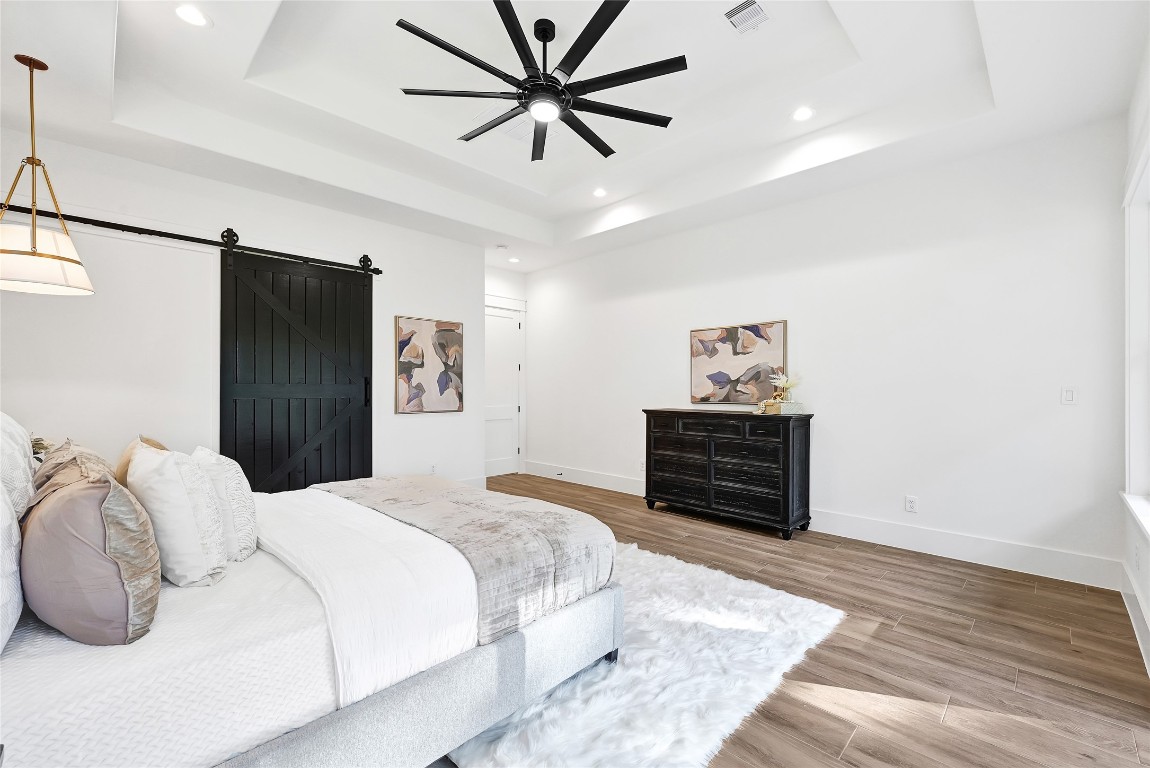 7244 Red Oak Grove Road Montgomery, TX 77316 - Photo 16 of 49 a bedroom with a bed and a dresser