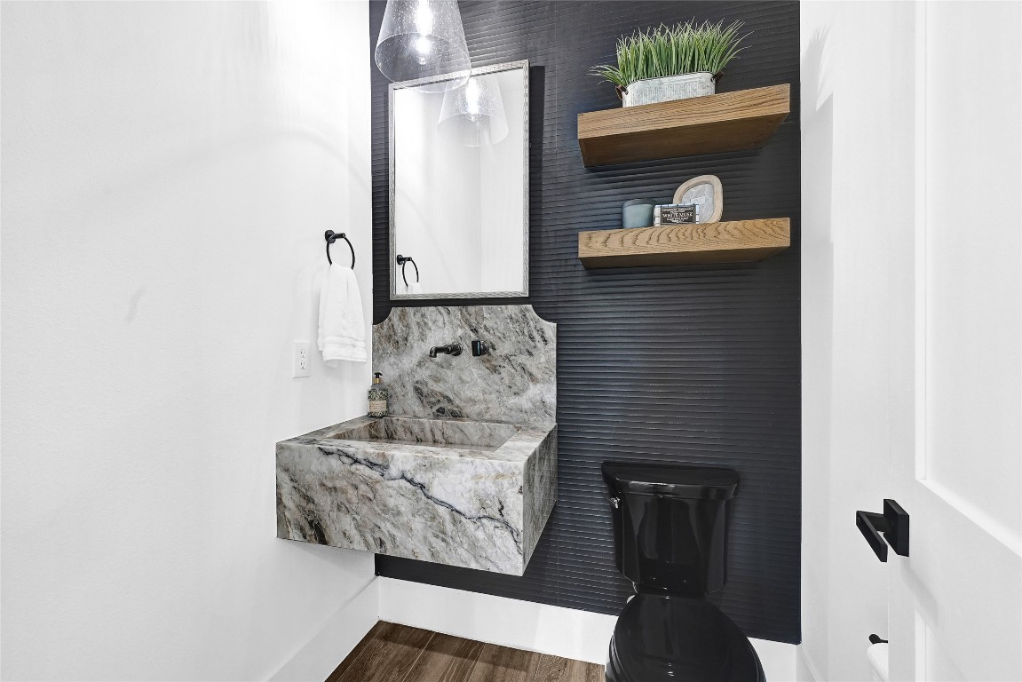 7244 Red Oak Grove Road Montgomery, TX 77316 - Photo 24 of 49 a bathroom with a sink and a mirror