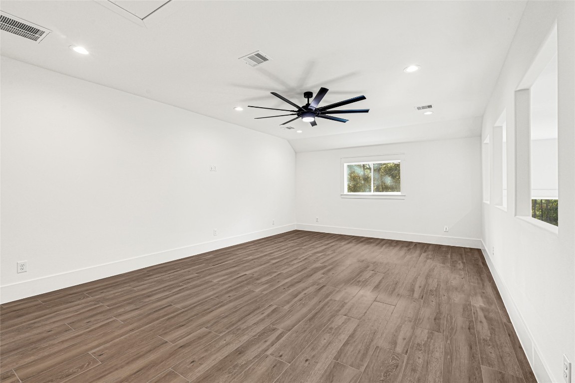 7244 Red Oak Grove Road Montgomery, TX 77316 - Photo 36 of 49 wooden floor in an empty room with a window