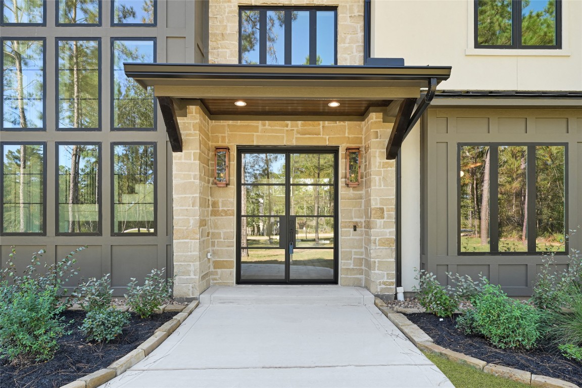 7244 Red Oak Grove Road Montgomery, TX 77316 - Photo 4 of 49 a front view of a house with a porch