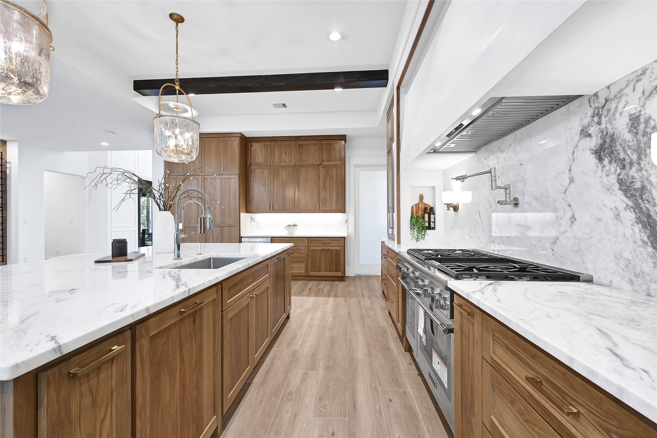 7244 Red Oak Grove Road Montgomery, TX 77316 - Photo 9 of 49 a kitchen with stainless steel appliances granite countertop a sink stove and cabinets