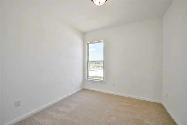 an empty room with window