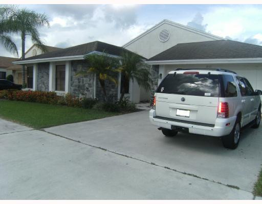 21131 Rustlewood Avenue Boca Raton, FL 33428 - Photo 4 of 13 Exterior Front