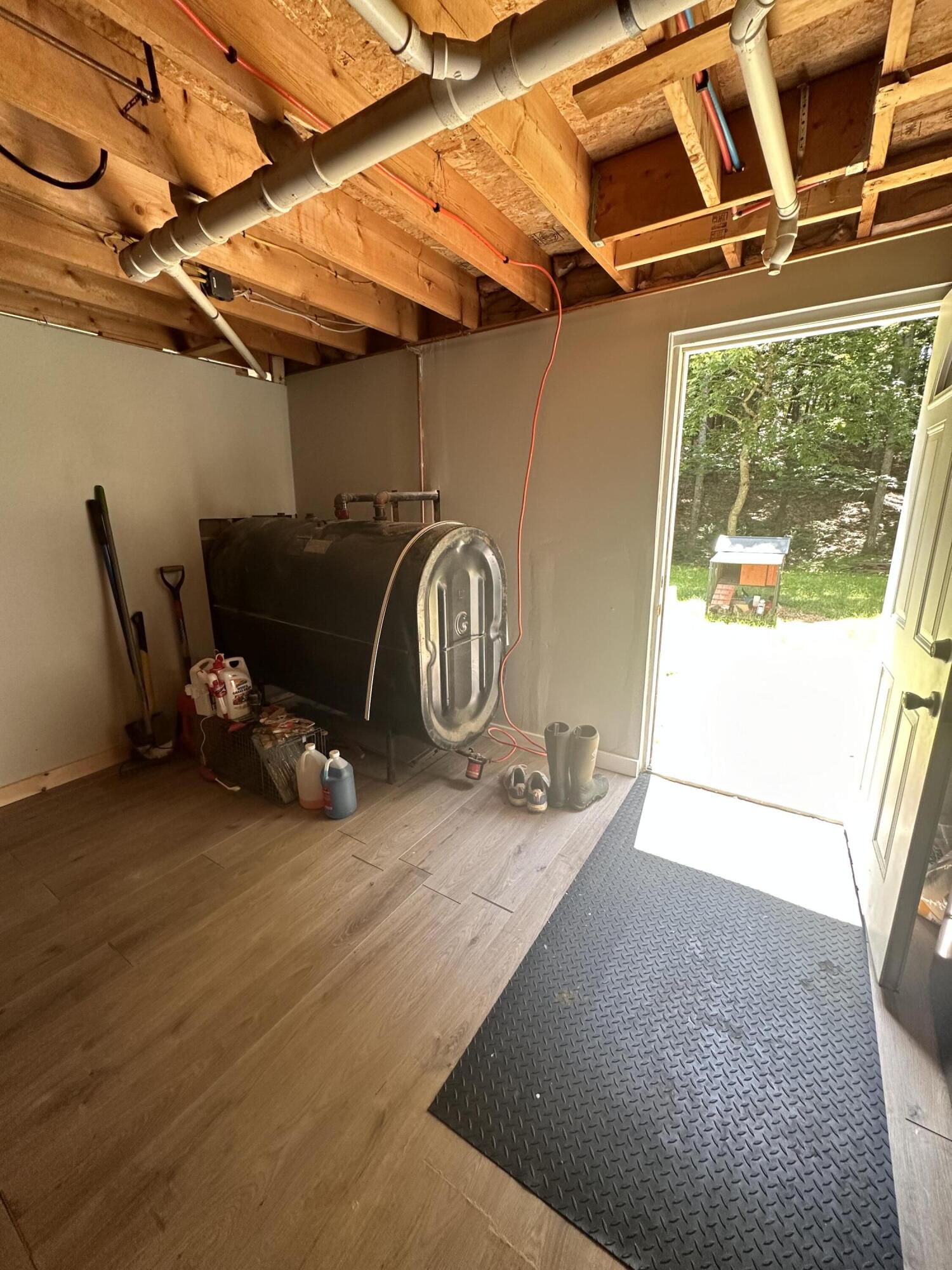 39 Fairbanks Road Manchester, ME 04351 - Photo 26 of 29 basement left side entrance