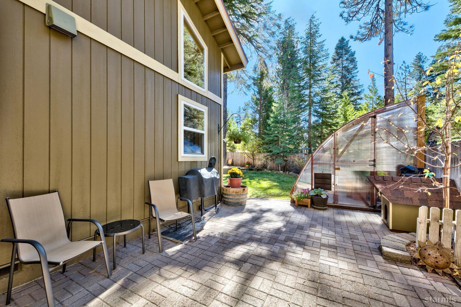 712 Sand Harbor Road South Lake Tahoe, CA 96150 - Photo 11 of 38 a backyard of a house with outdoor seating