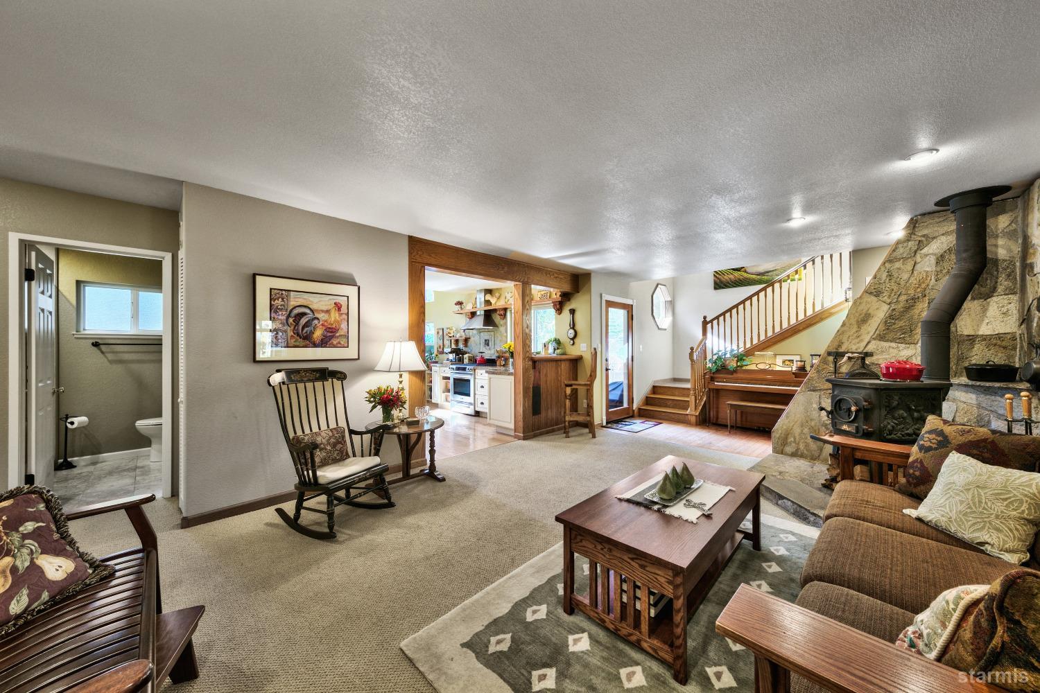 712 Sand Harbor Road South Lake Tahoe, CA 96150 - Photo 14 of 38 a living room with furniture a air conditioner vent and a window
