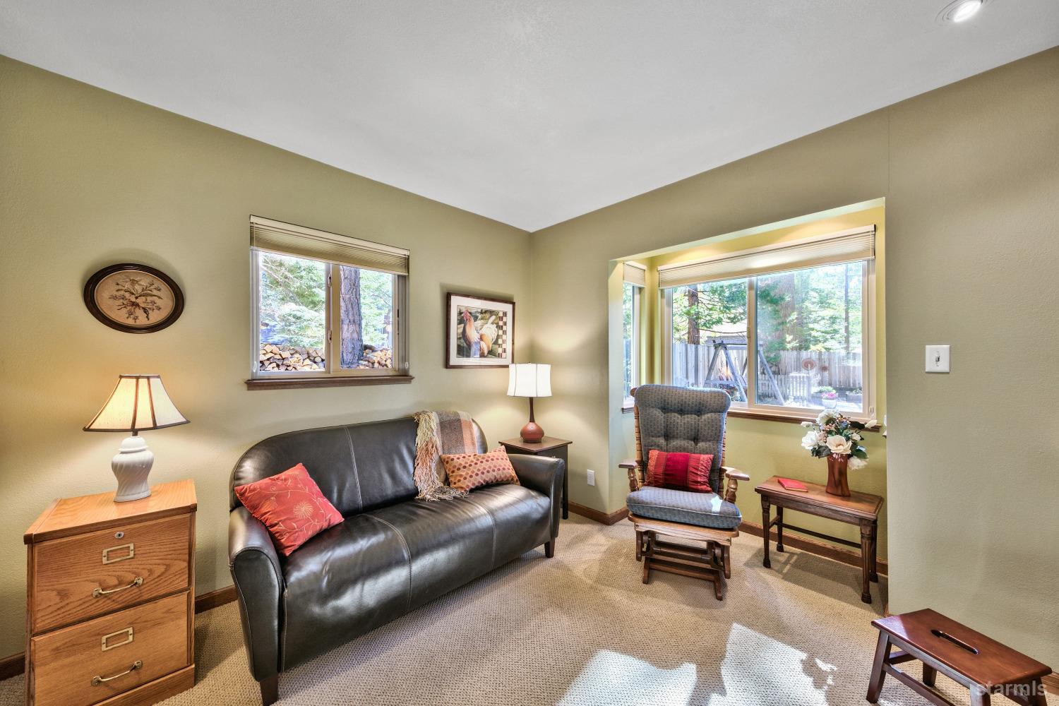 712 Sand Harbor Road South Lake Tahoe, CA 96150 - Photo 19 of 38 a living room with furniture and a window
