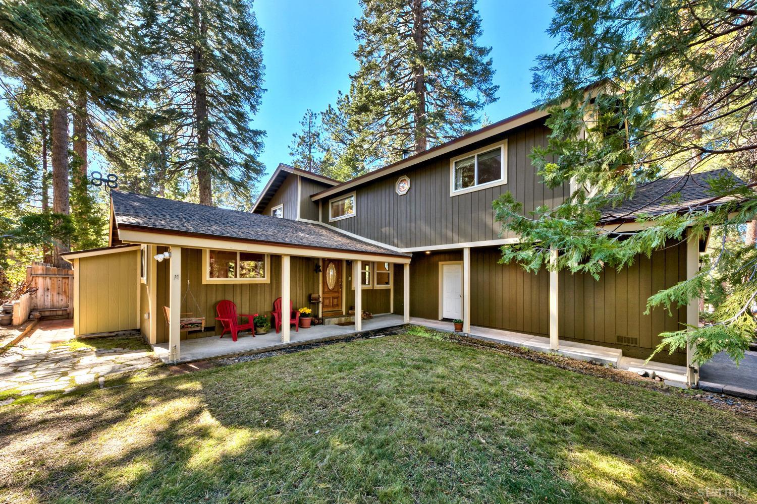 712 Sand Harbor Road South Lake Tahoe, CA 96150 - Photo 3 of 38 front view of a house with a yard