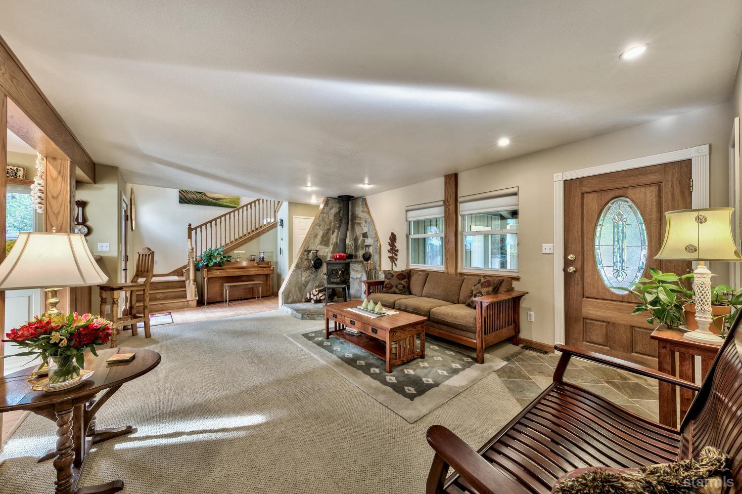 712 Sand Harbor Road South Lake Tahoe, CA 96150 - Photo 31 of 38 a living room with furniture and a large window