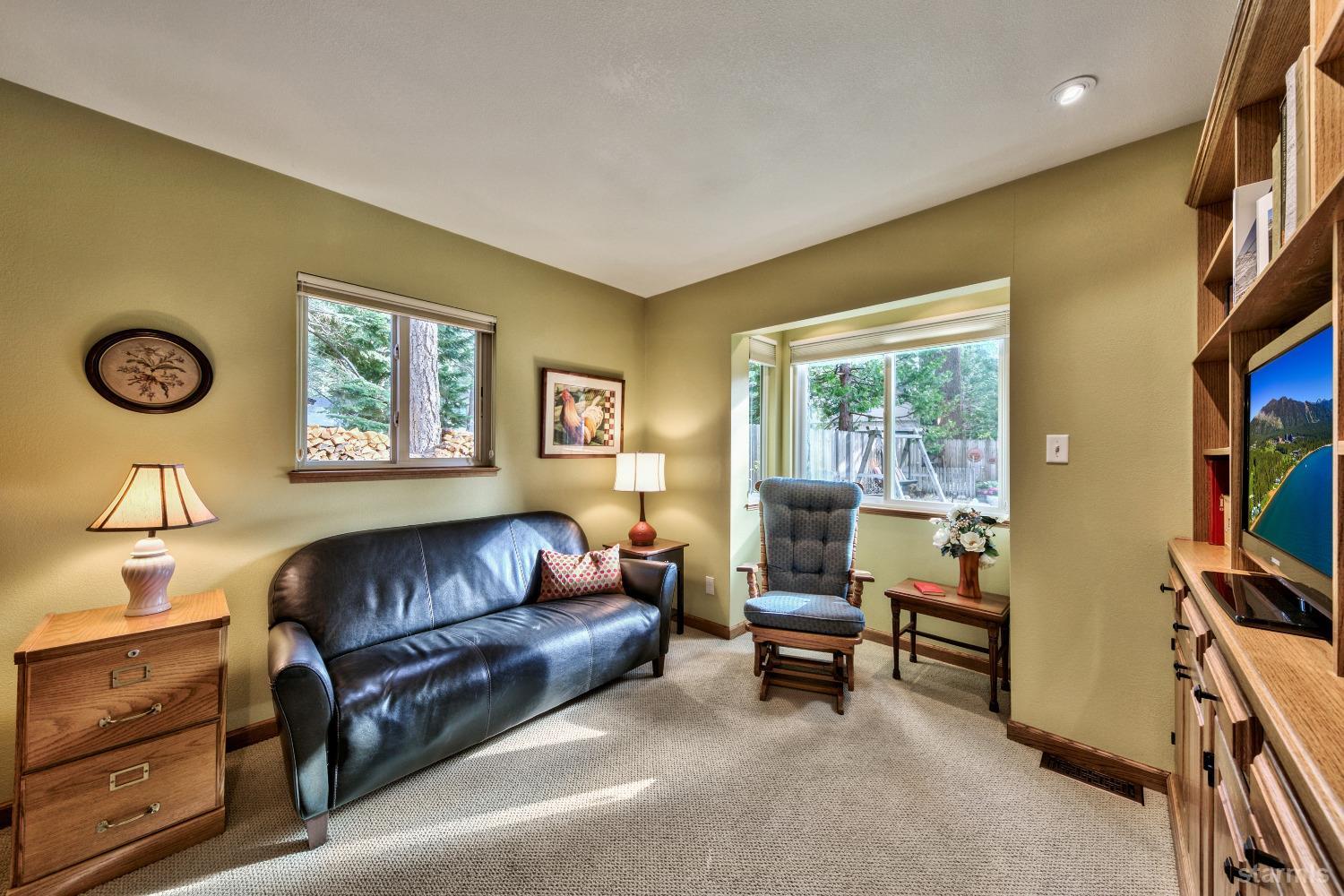 712 Sand Harbor Road South Lake Tahoe, CA 96150 - Photo 33 of 38 a living room with furniture and a window