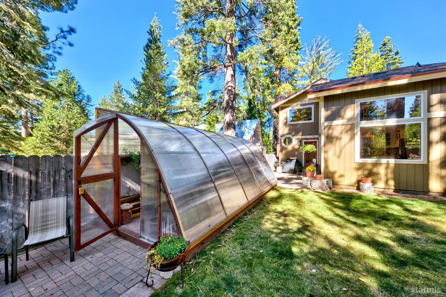 712 Sand Harbor Road South Lake Tahoe, CA 96150 - Photo 6 of 38 a view of a house with backyard and sitting area