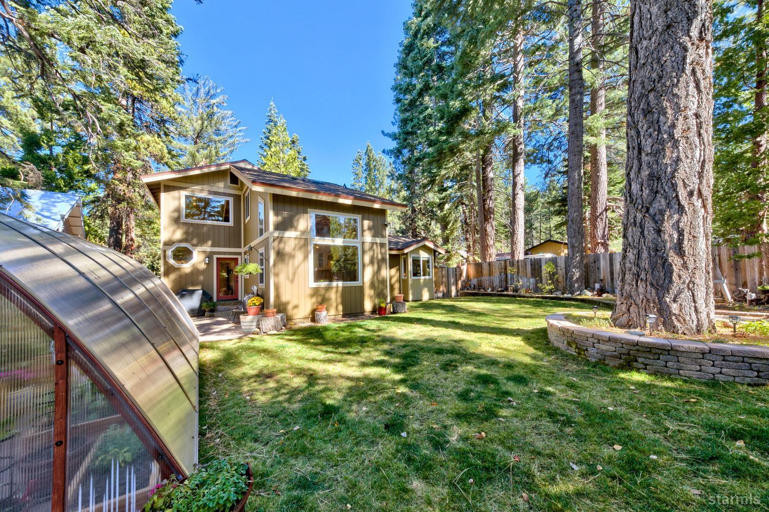 712 Sand Harbor Road South Lake Tahoe, CA 96150 - Photo 7 of 38 a view of a house with a yard