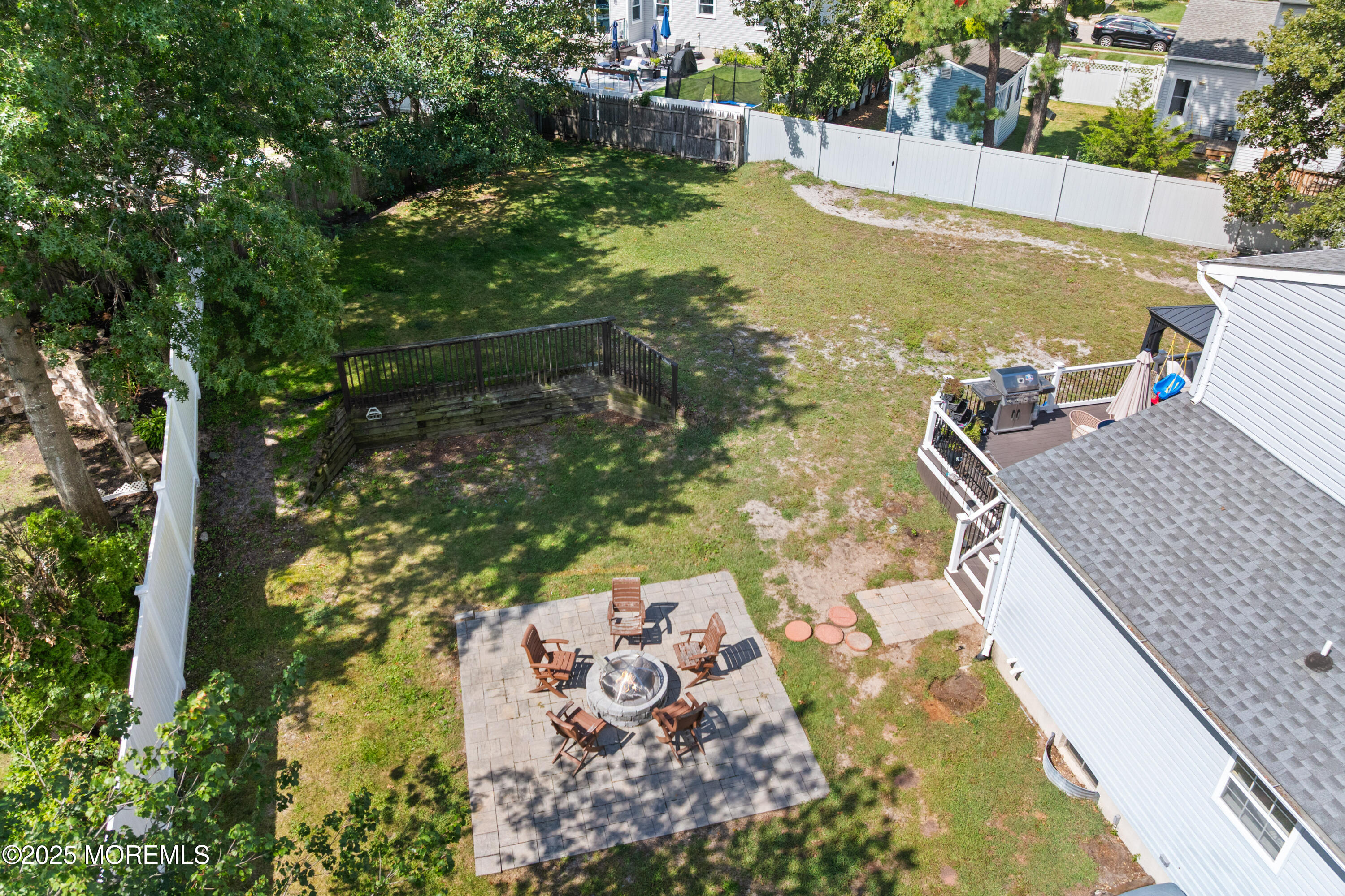 832 Constitution Drive Brick, NJ 08724 - Photo 22 of 24 a view of a swimming pool with a patio