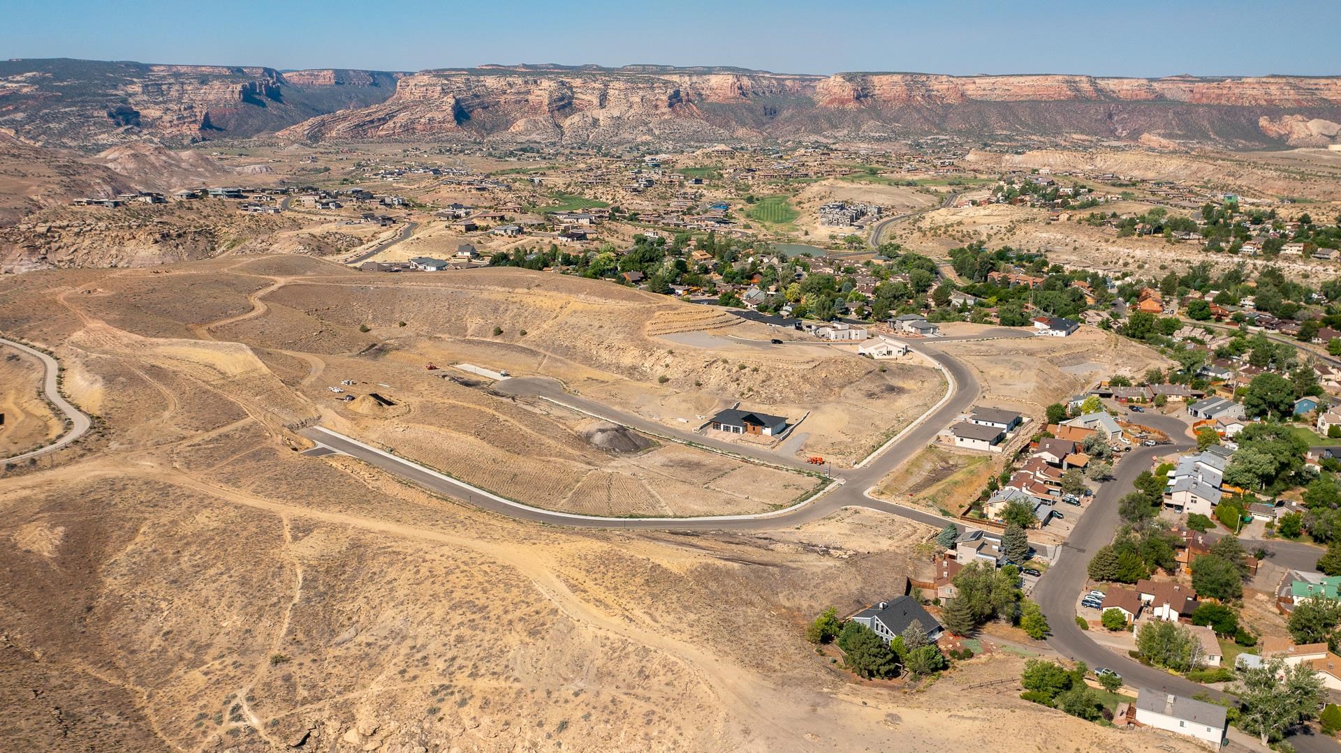 360 Hidden Court Grand Junction, CO 81507 - Photo 16 of 19 a view of a wooden floor with a mountain view