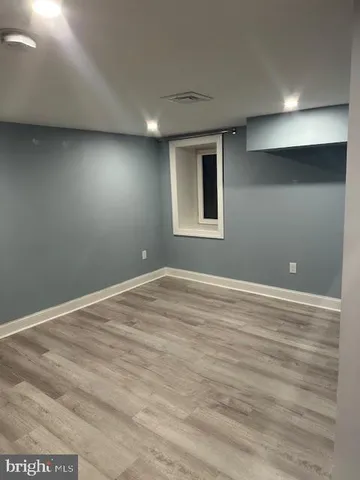 a view of an empty walk in closet