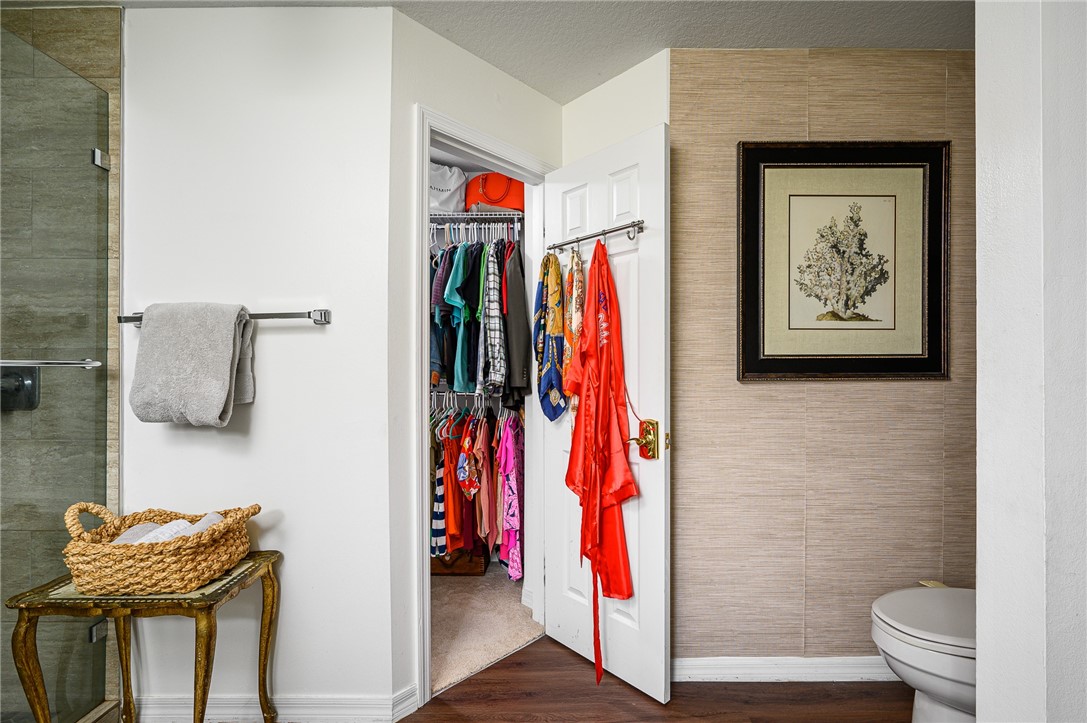 114 Drake Way Sebastian, FL 32958 - Photo 13 of 34 a view of walk in closet with clothes and shoes