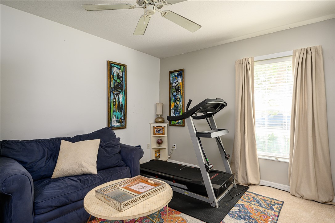 114 Drake Way Sebastian, FL 32958 - Photo 18 of 34 a living room with furniture a air conditioner vent and a window