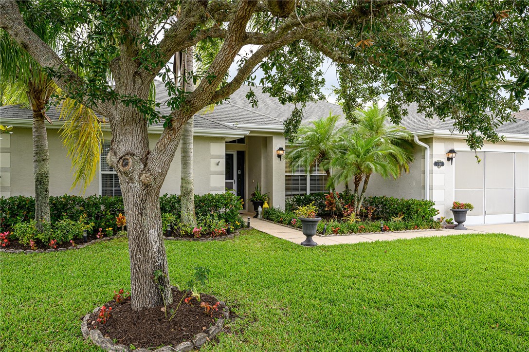 114 Drake Way Sebastian, FL 32958 - Photo 33 of 34 front view of a house with a yard
