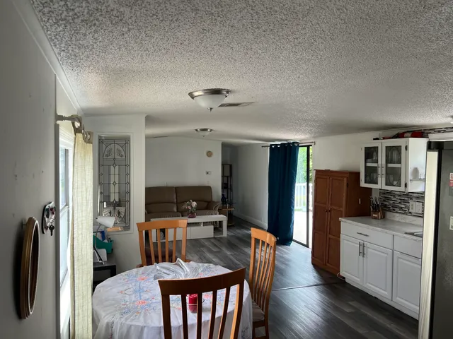 a bathroom with a double vanity sink and mirror