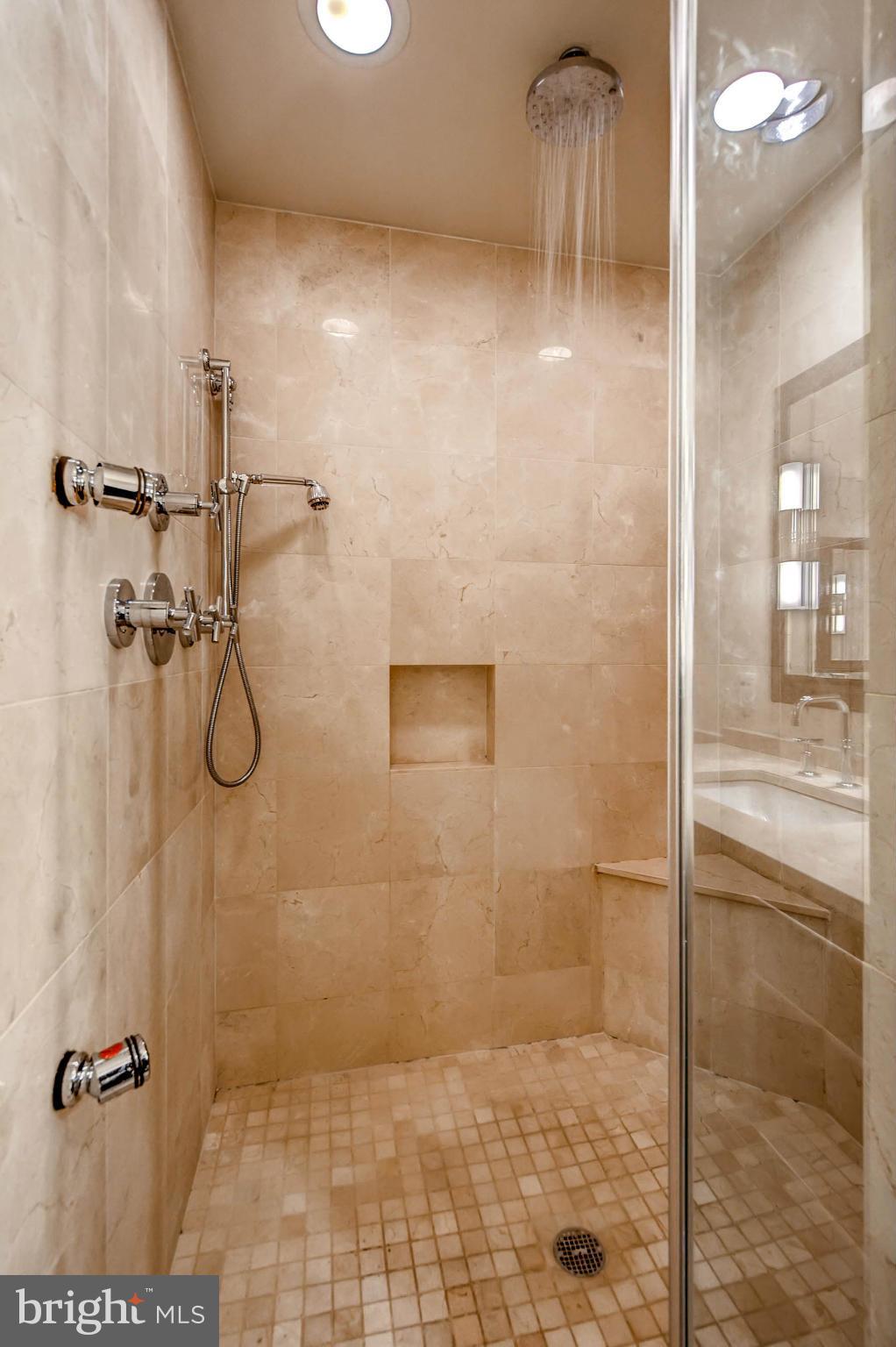 801 Key Highway, Unit 122 Baltimore, MD 21230 - Photo 21 of 30 a bathroom with a shower