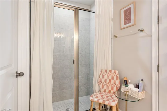 a view of a lake with houses in the back