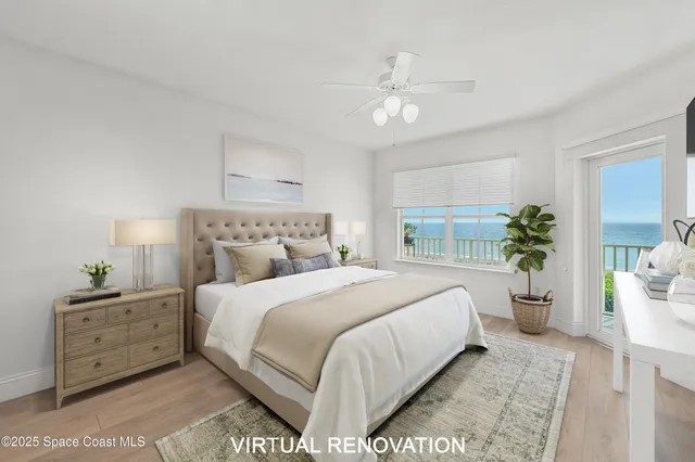 a bedroom with a bed and ceiling fan