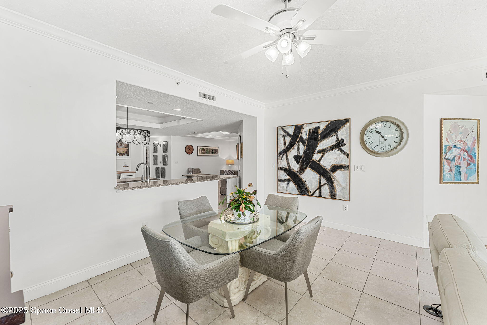505 South Miramar Avenue, Unit 2403 Indialantic, FL 32903 - Photo 17 of 43 a dining room with furniture and window
