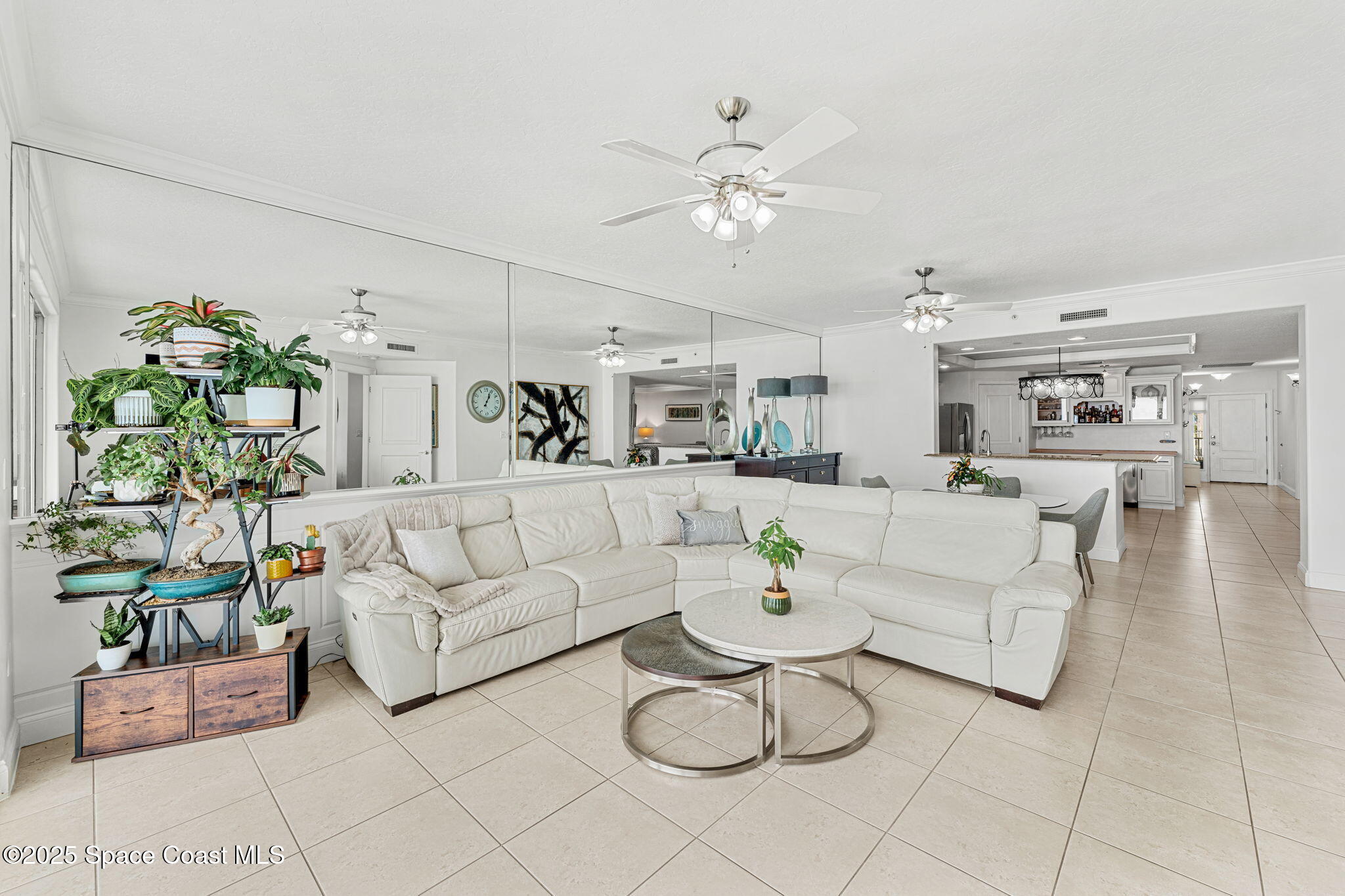 505 South Miramar Avenue, Unit 2403 Indialantic, FL 32903 - Photo 19 of 43 a living room with furniture and white walls