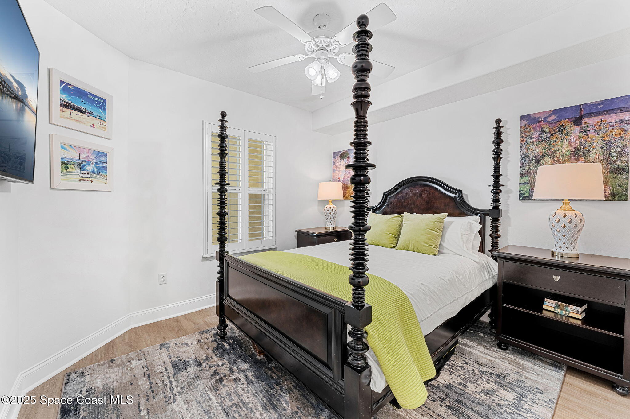 505 South Miramar Avenue, Unit 2403 Indialantic, FL 32903 - Photo 28 of 43 a bedroom with a bed dresser and window