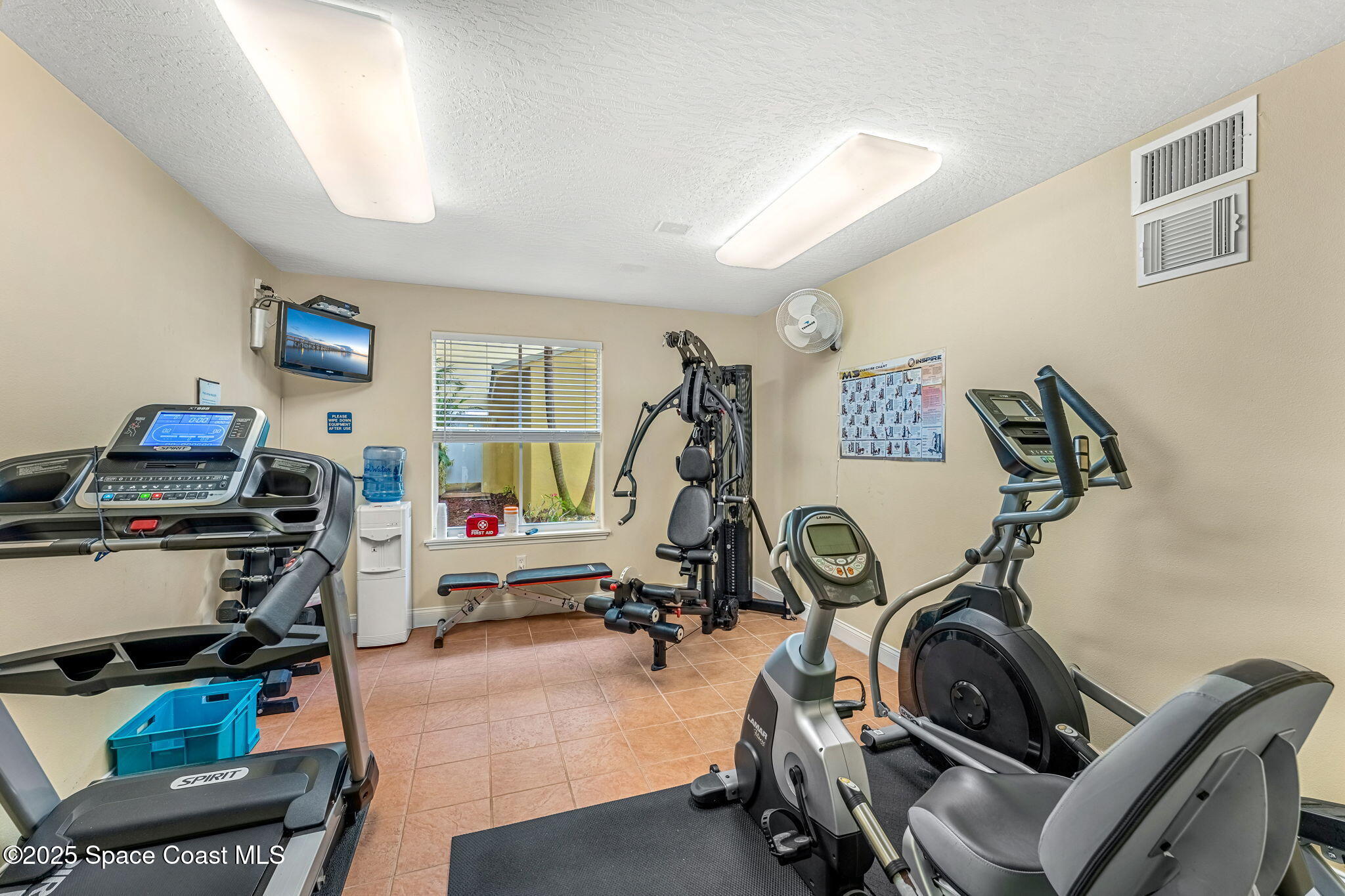 505 South Miramar Avenue, Unit 2403 Indialantic, FL 32903 - Photo 37 of 43 a view of a room with gym equipment