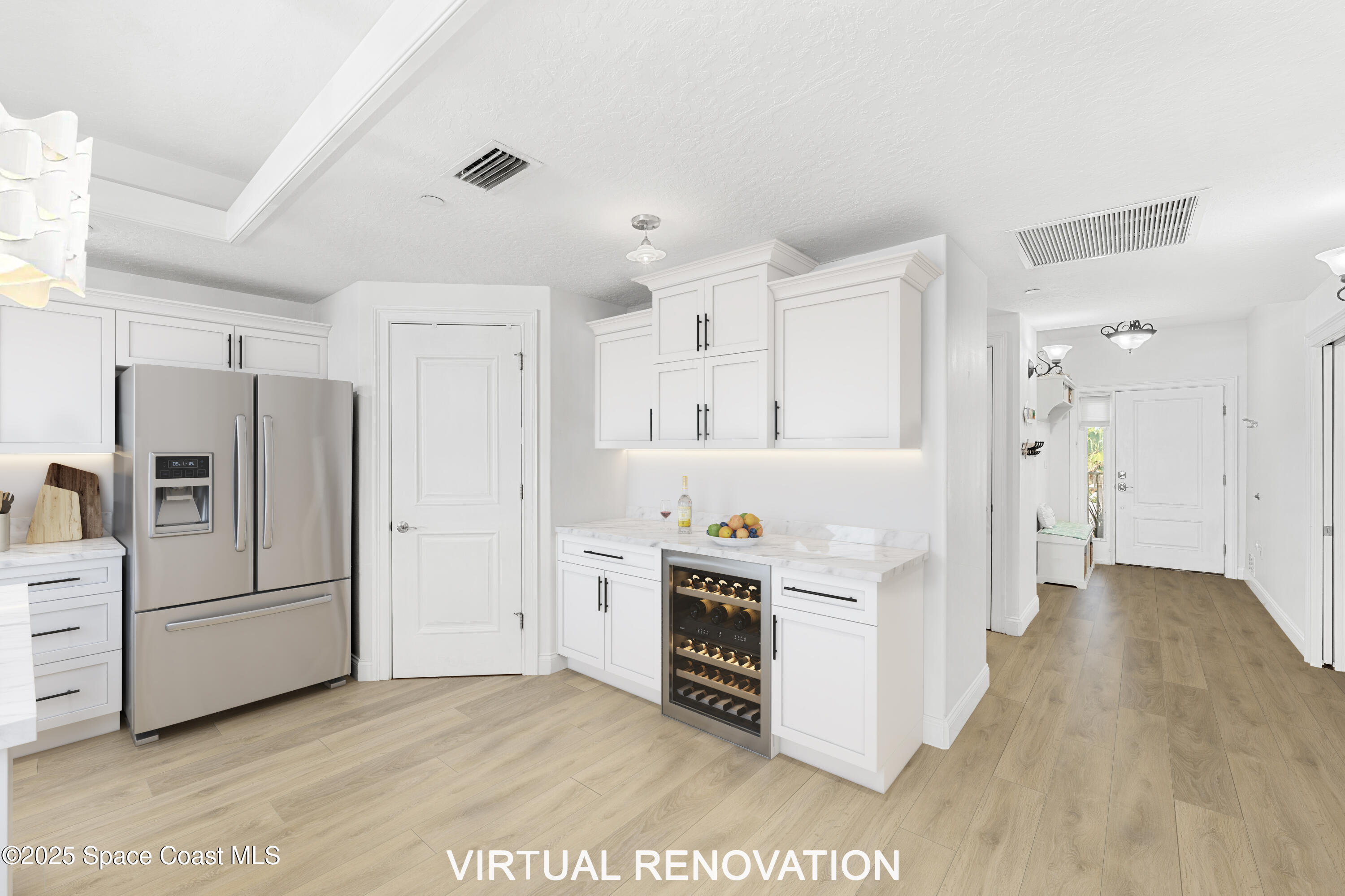 505 South Miramar Avenue, Unit 2403 Indialantic, FL 32903 - Photo 10 of 43 a kitchen with stainless steel appliances a refrigerator and a stove