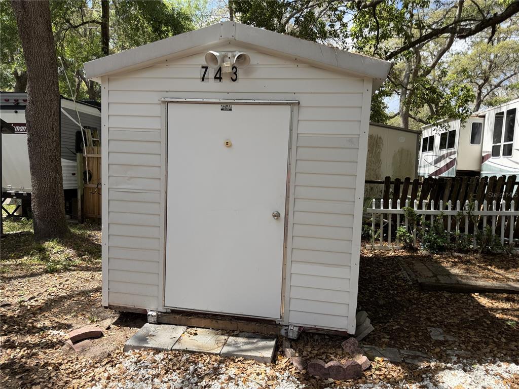 3000 Clarcona Road, Unit 743 Apopka, FL 32703 - Photo 9 of 54 a view of a house with a yard