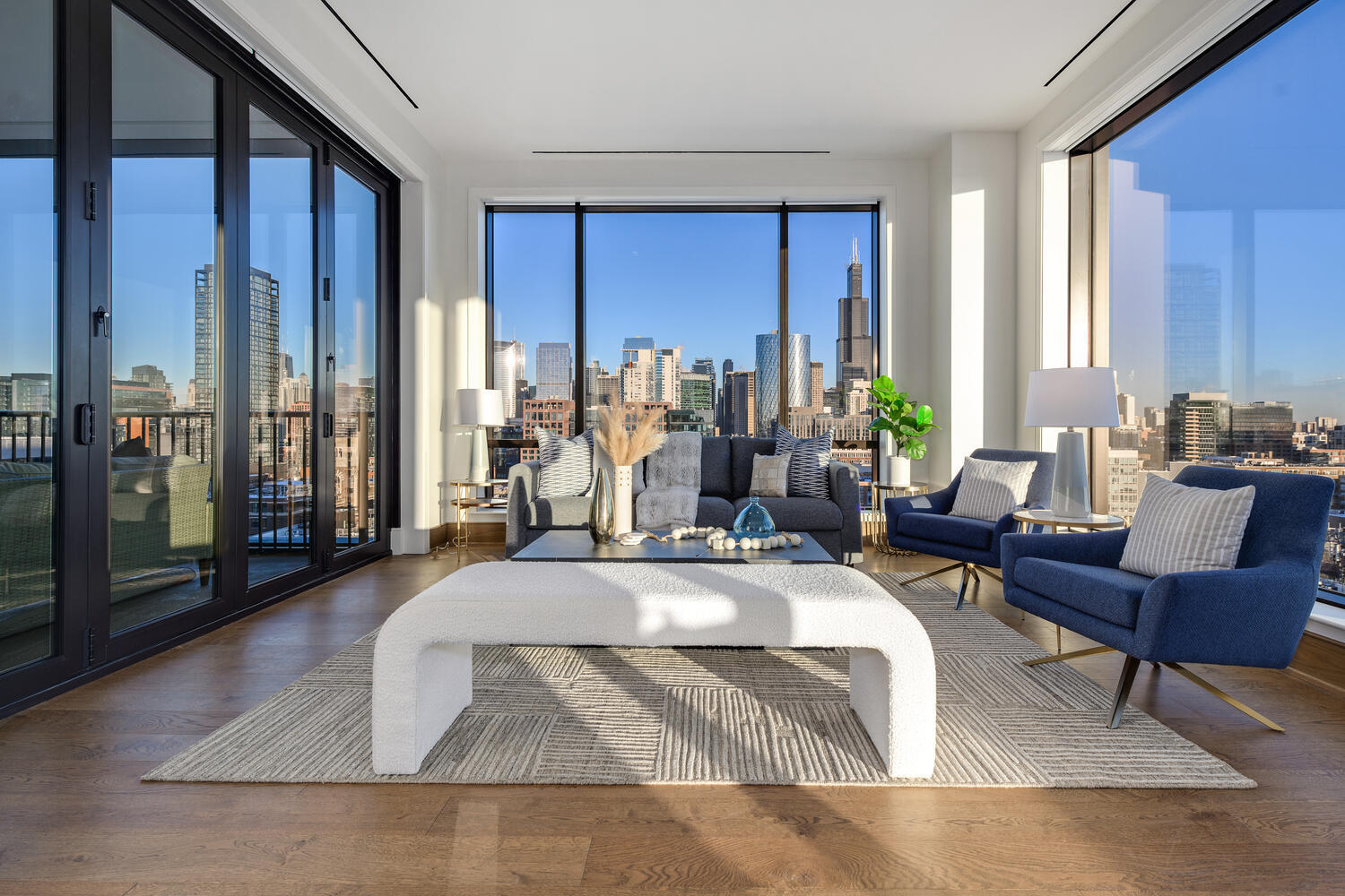 21 North May Street, Unit 1301 Chicago, IL 60607 - Photo 12 of 44 a living room with furniture and a large window