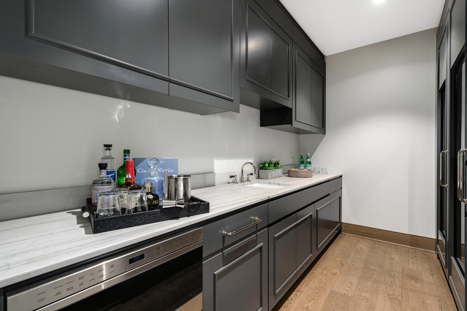 21 North May Street, Unit 1301 Chicago, IL 60607 - Photo 18 of 44 a kitchen with a sink and cabinets