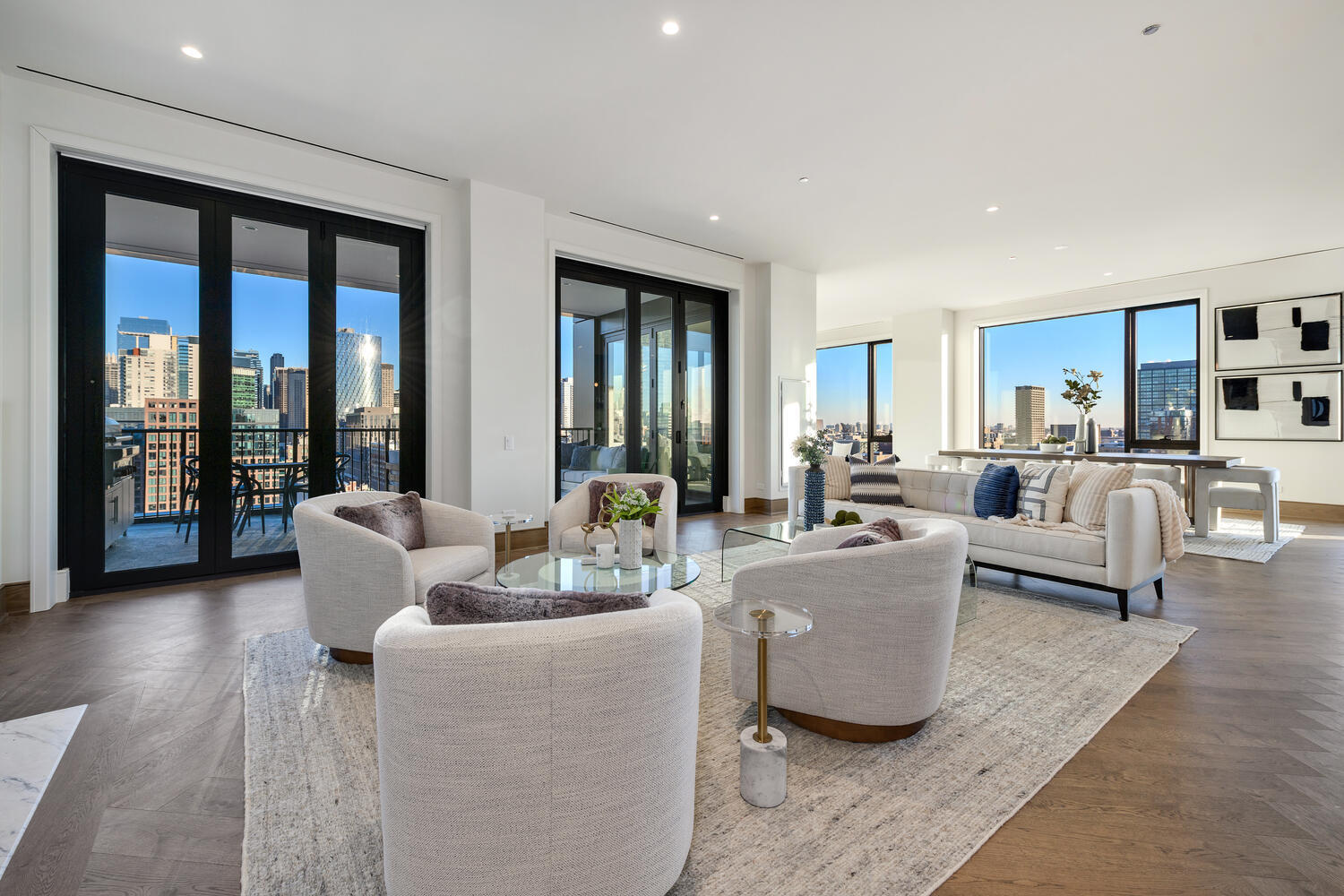 21 North May Street, Unit 1301 Chicago, IL 60607 - Photo 3 of 44 a living room with furniture and large windows