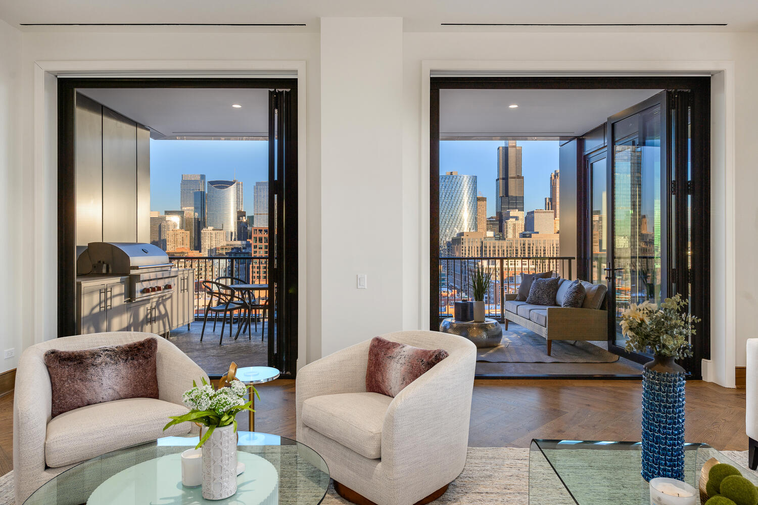 21 North May Street, Unit 1301 Chicago, IL 60607 - Photo 5 of 44 a living room with furniture and a potted plant