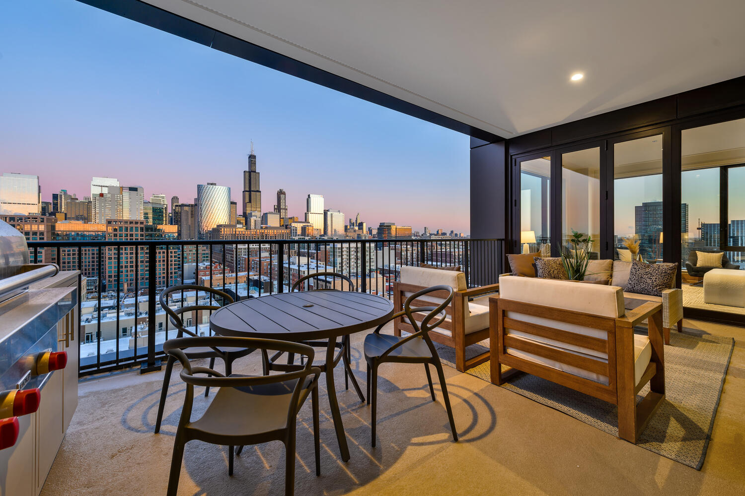 21 North May Street, Unit 1301 Chicago, IL 60607 - Photo 6 of 44 a view of a chairs and table in patio