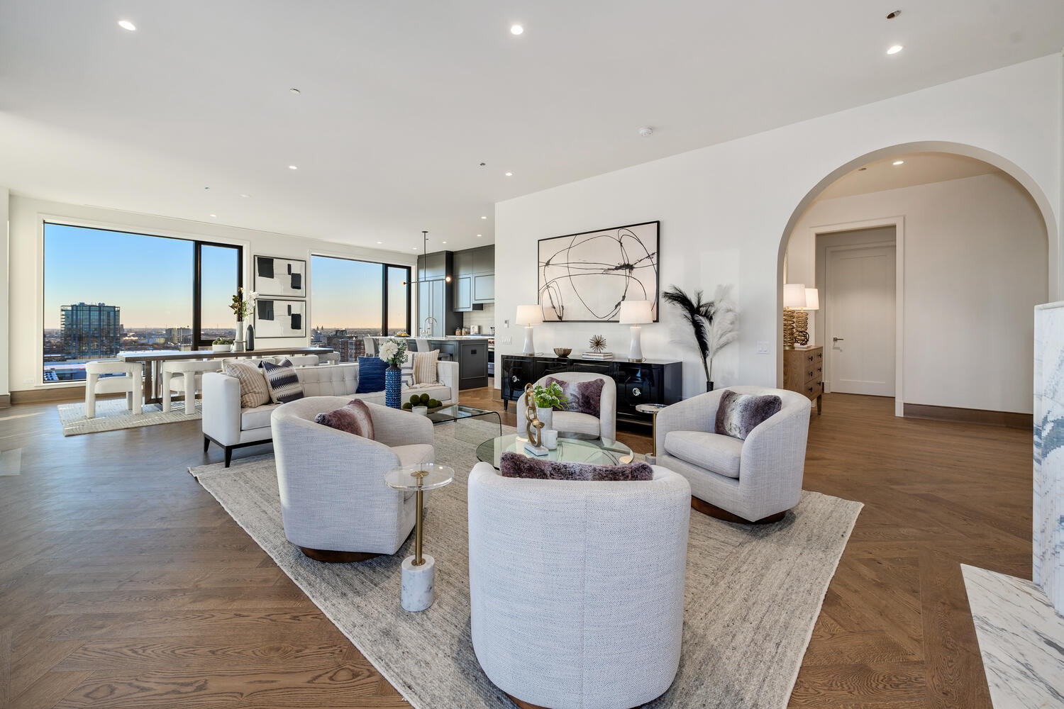 21 North May Street, Unit 1301 Chicago, IL 60607 - Photo 9 of 44 a living room with fireplace furniture and a view of kitchen