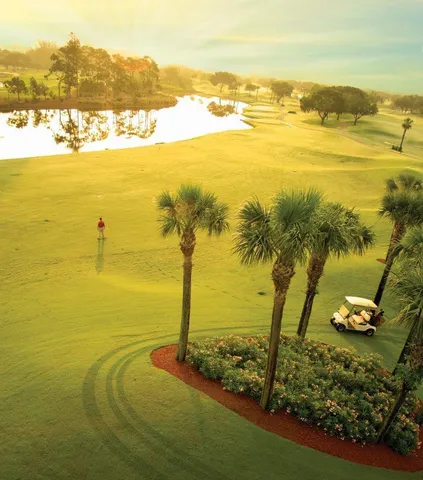 a view of a lake with a yard