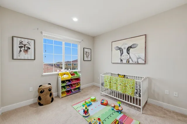 a view of a chairs and tables in the back yard of the house