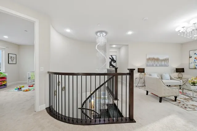 a view of a patio with couches and potted plants