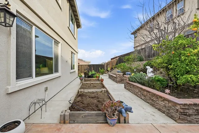 a front view of a house with a garage